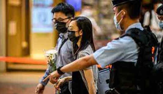 Hong Kong police warn residents against mourning man who stabbed officer